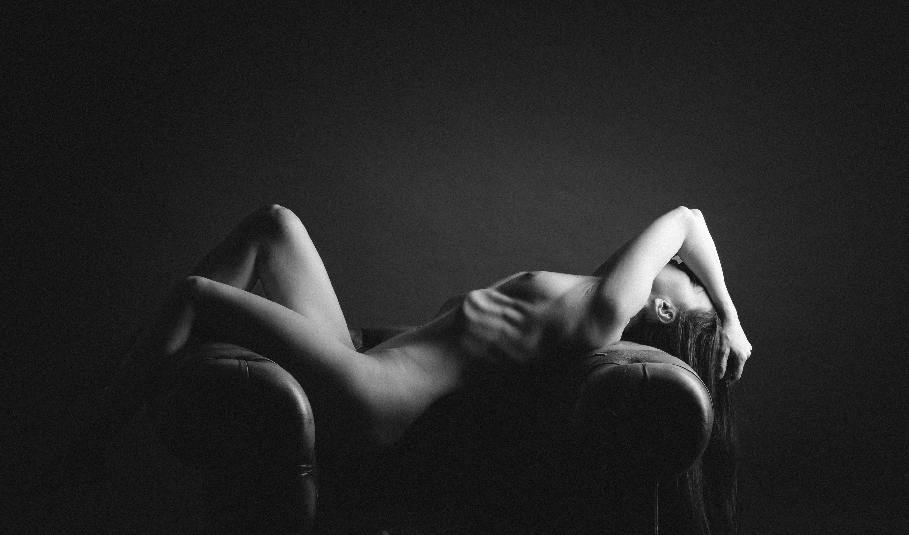 Woman relaxing on chair.